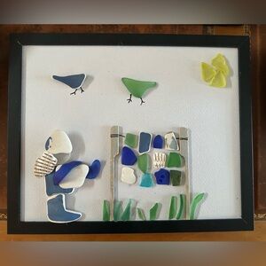 Porcelain and sea glass lady hanging out a patchwork quilt